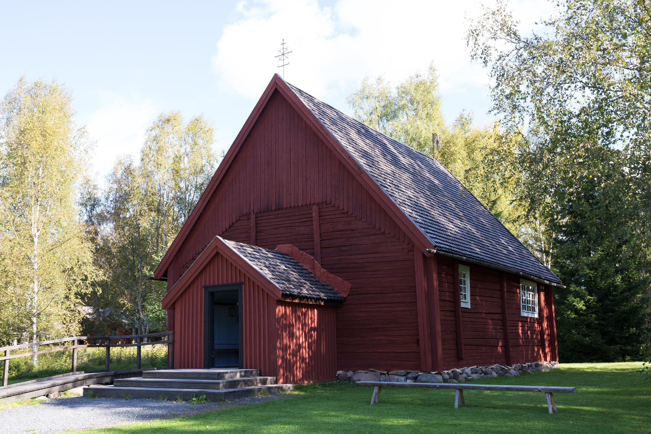 Turkansaari Church from the outside. Red, wooden church, sunny day in summertime.. 
